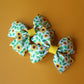 Hair bows with green and yellow sunflowers