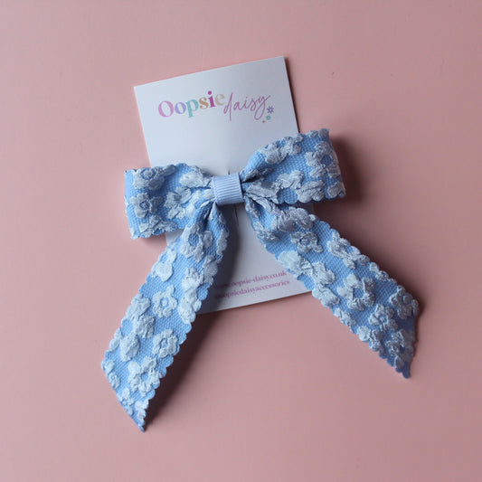 Pale blue floral hair bow
