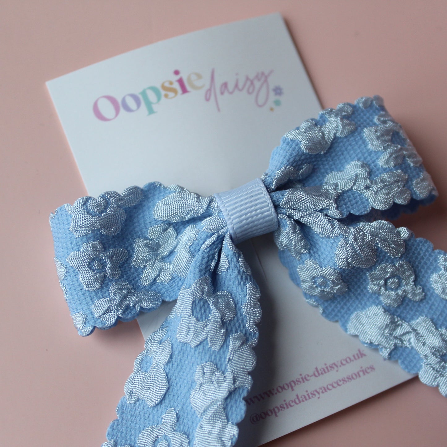 Pale blue floral hair bow