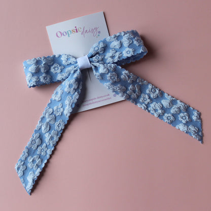 Pale blue floral hair bow