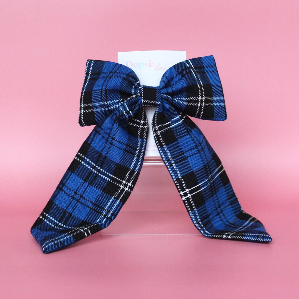 Blue and black plaid tartan bow