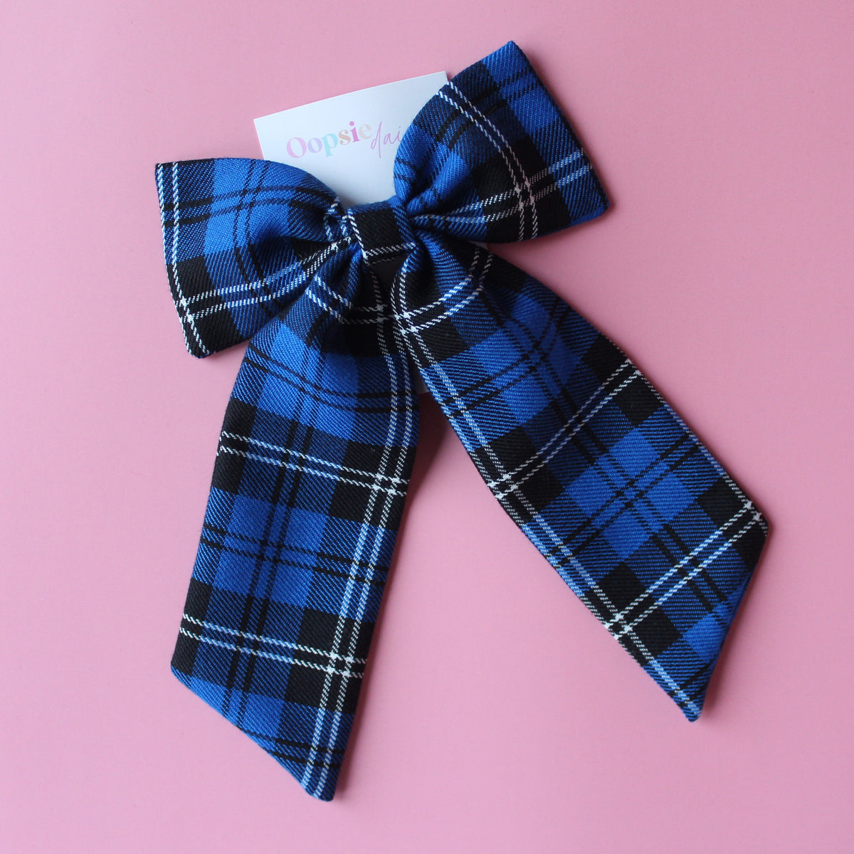 Blue and black plaid tartan bow