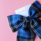 Blue and black plaid tartan bow