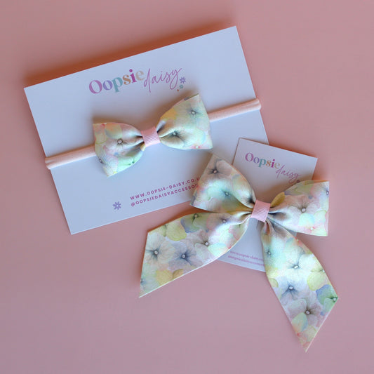 Sister or mum and baby matching hair set with hair bow and baby headband - pastel floral pattern