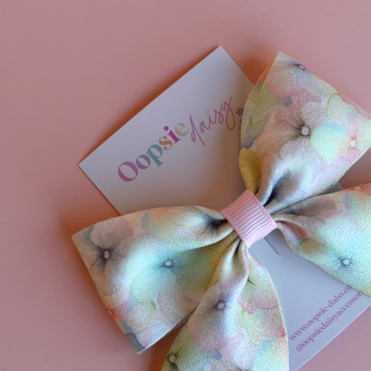 Pastel floral patterned hair bow