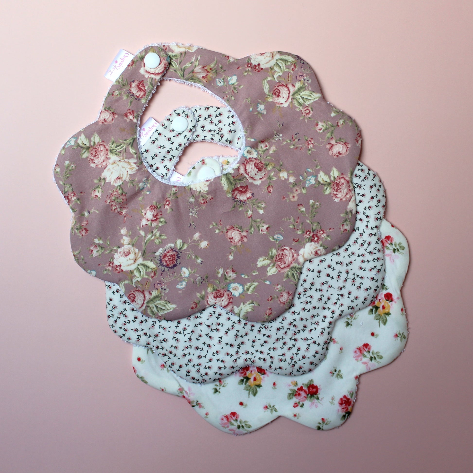 Set of 3 scallop baby bibs with vintage themed floral prints