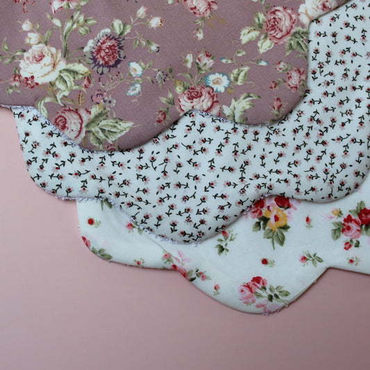 Set of 3 scallop baby bibs with vintage themed floral prints