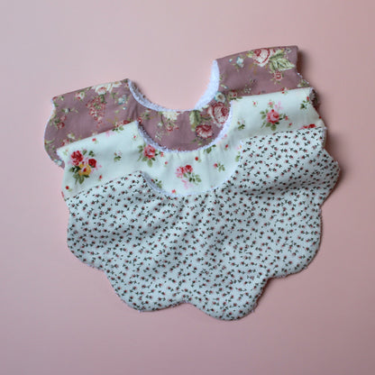 Set of 3 scallop baby bibs with vintage themed floral prints