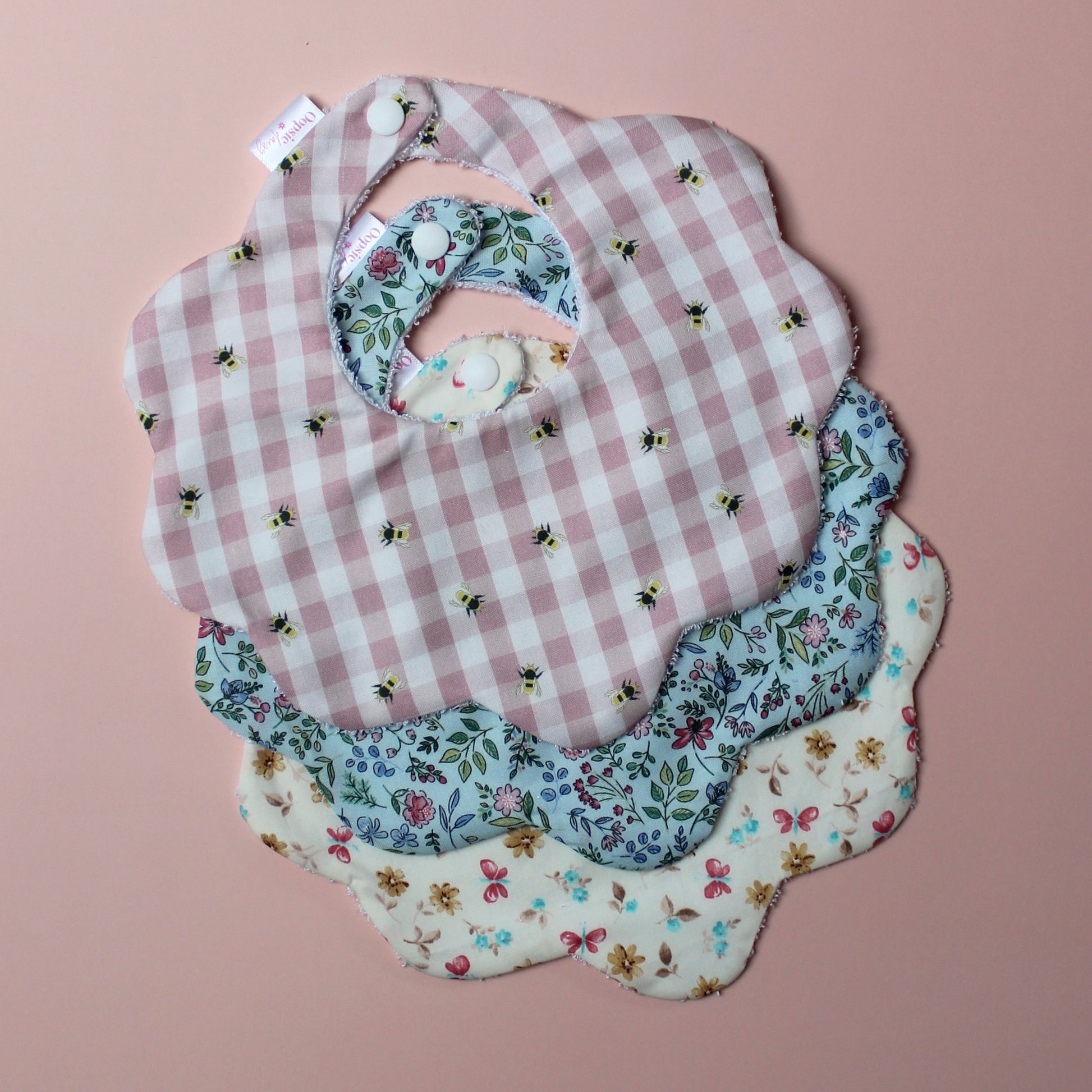 Set of 3 girl scallop baby bibs with bee, butterfly and floral patterns