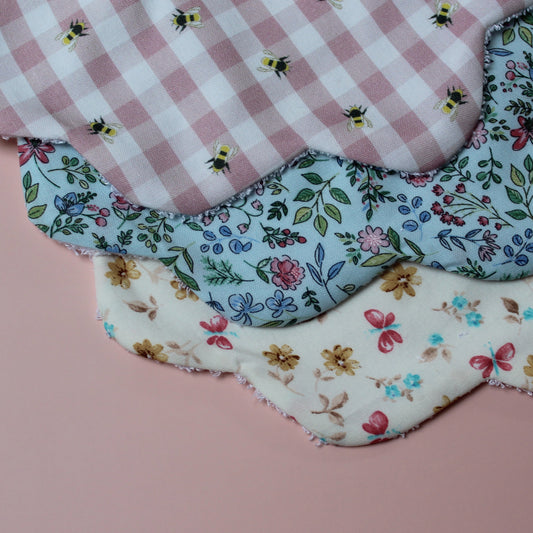 Set of 3 girl scallop baby bibs with bee, butterfly and floral patterns