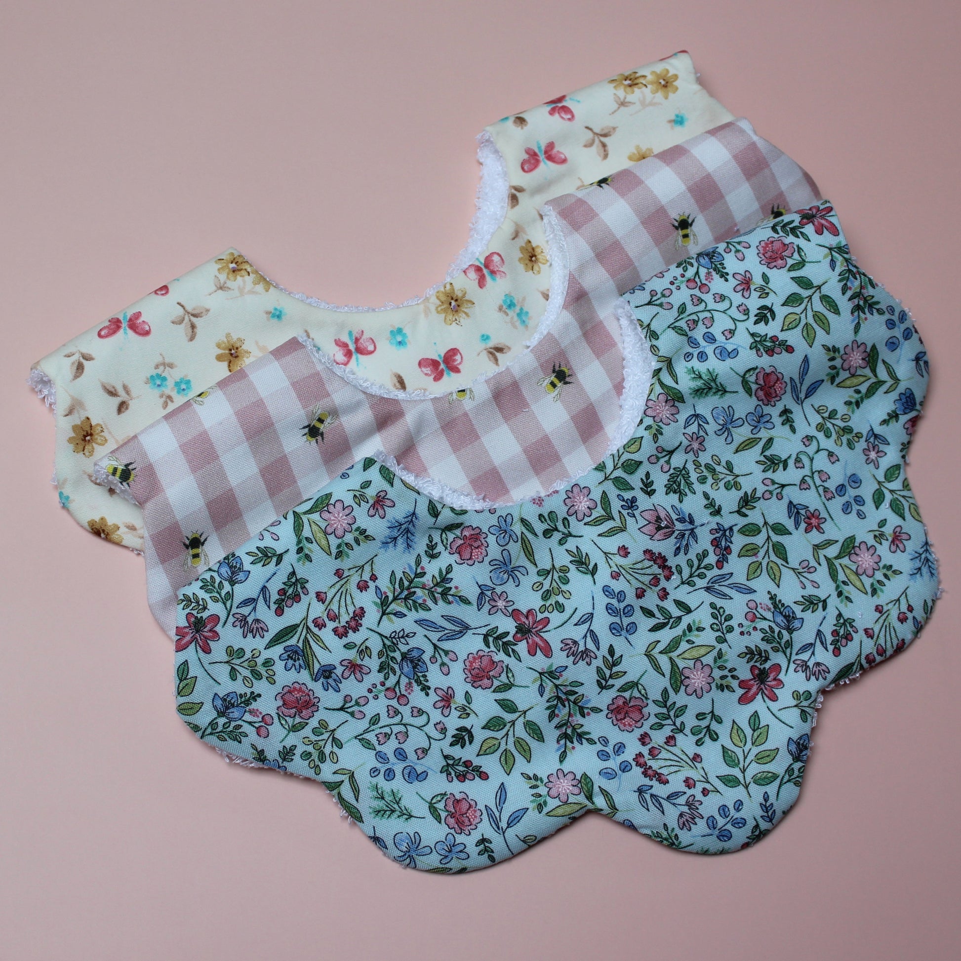 Set of 3 girl scallop baby bibs with bee, butterfly and floral patterns