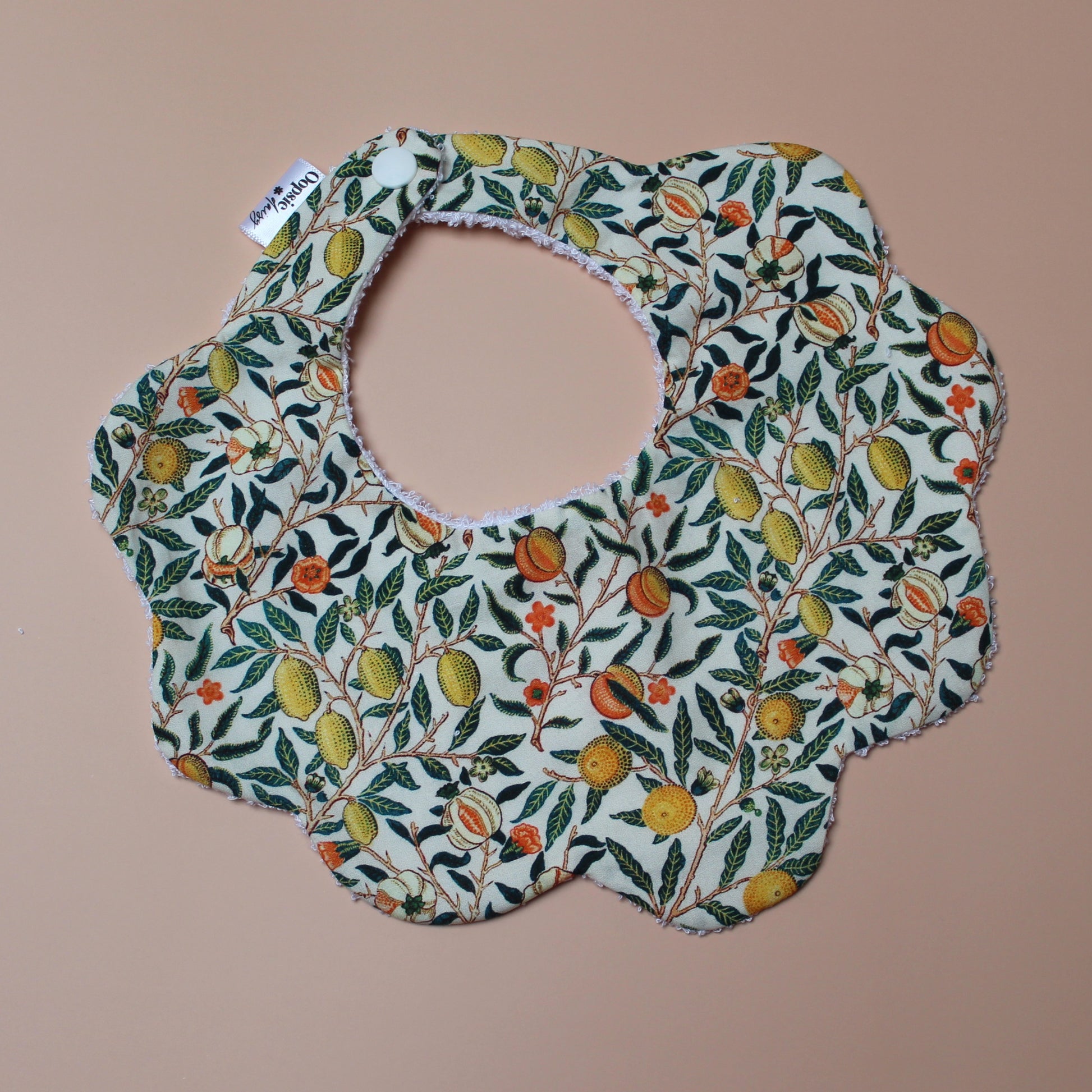 Scallop baby bib in William Morris Pomegranate pattern