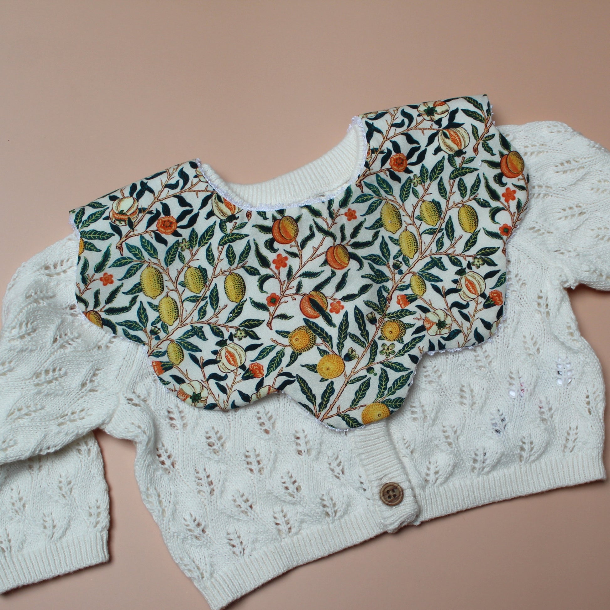 Scallop baby bib in William Morris Pomegranate pattern