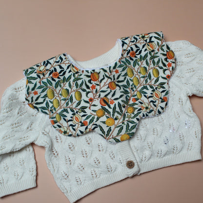 Scallop baby bib in William Morris Pomegranate pattern