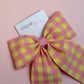 Pink and yellow gingham hair bow