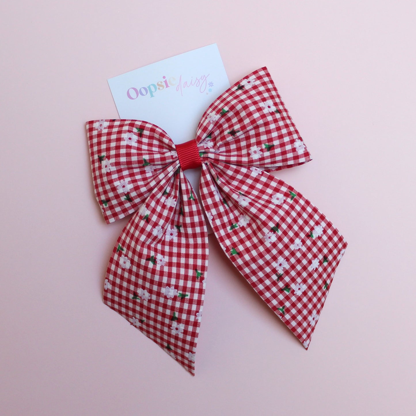 red and white gingham hair bow with flowers