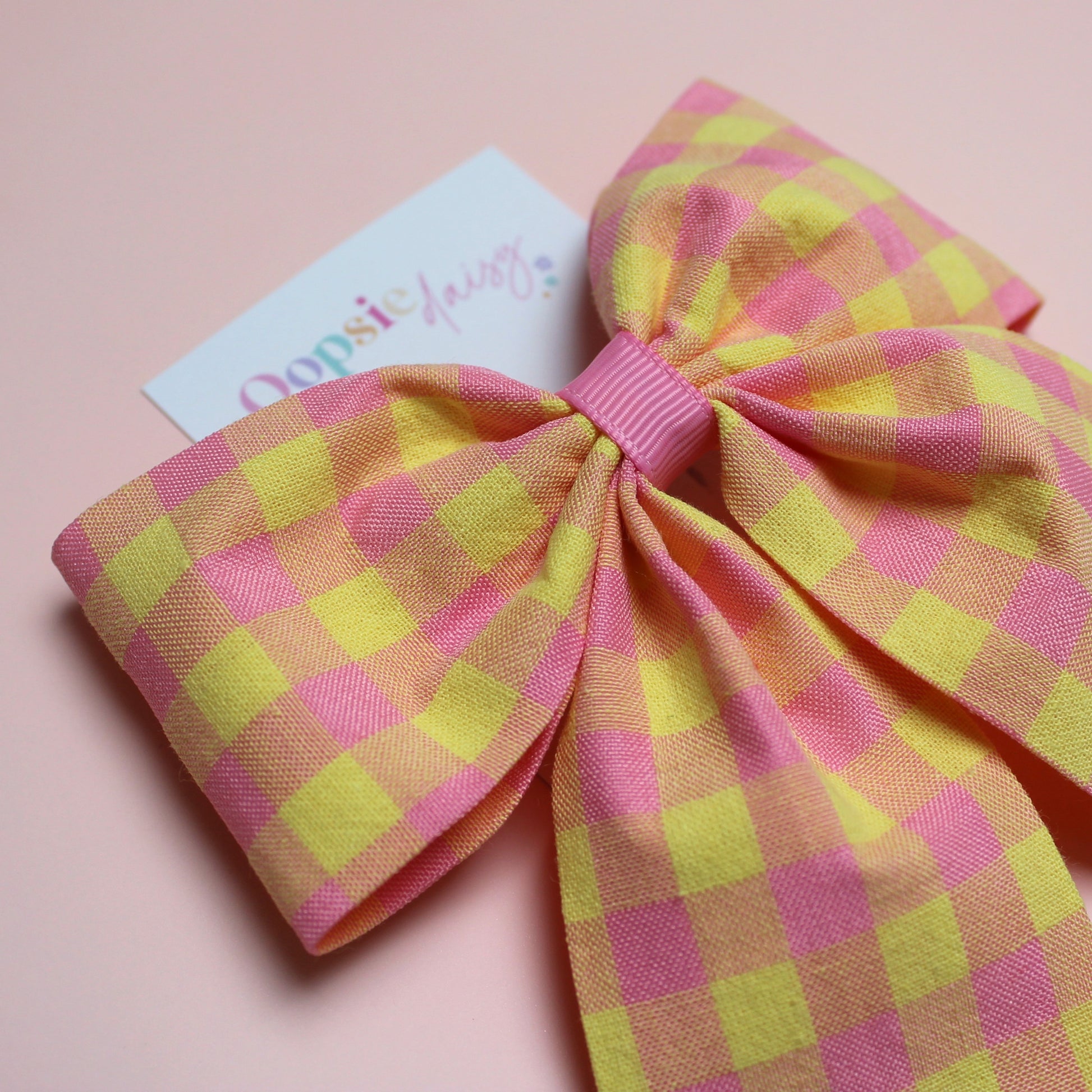 Pink and yellow gingham hair bow