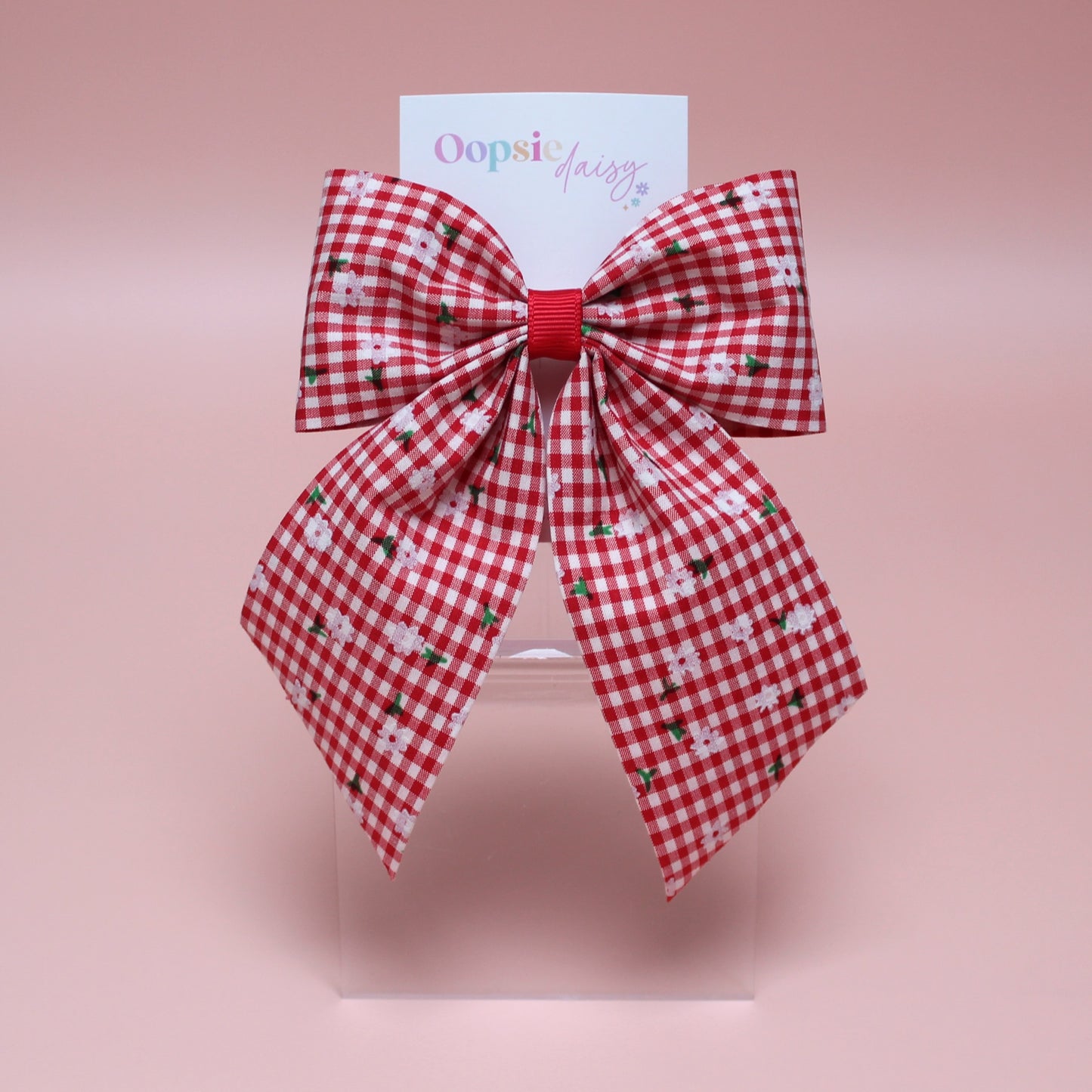 red and white gingham hair bow with flowers