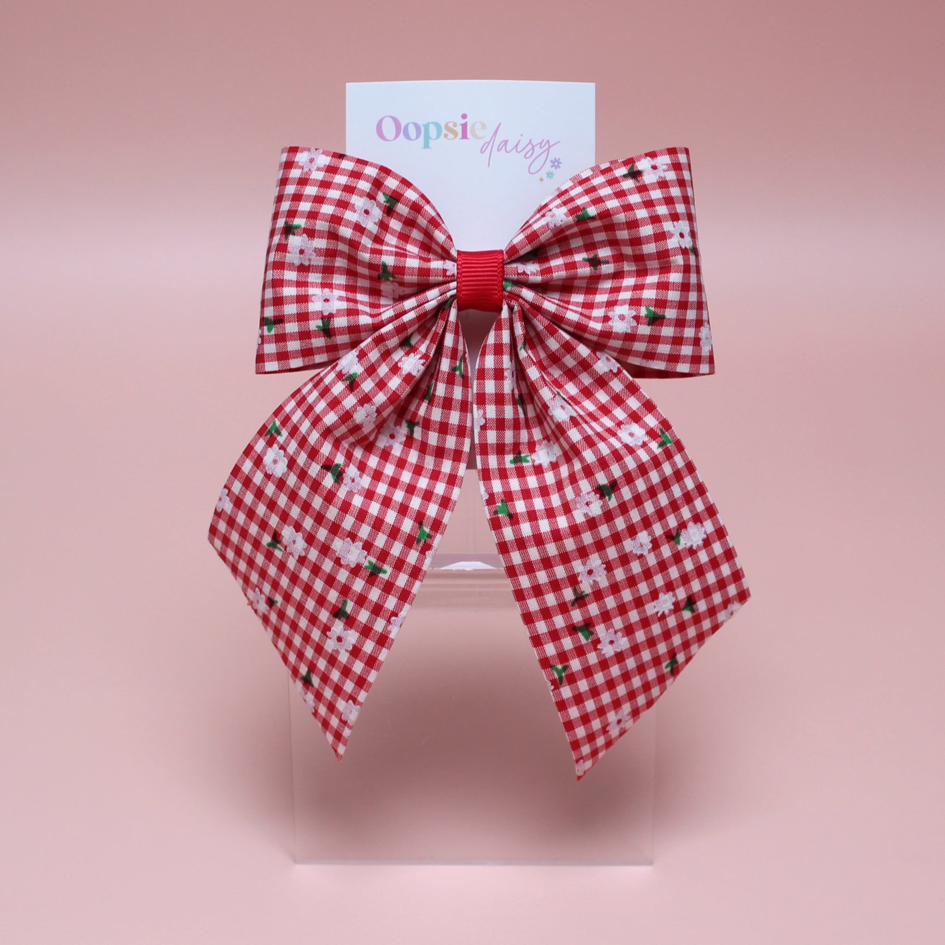 red and white gingham hair bow with flowers