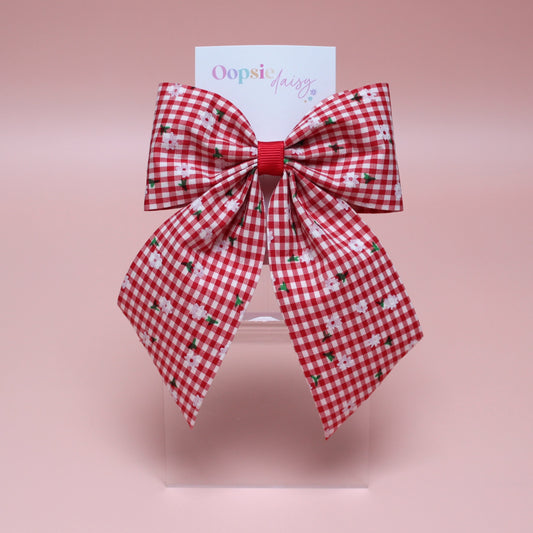 red and white gingham hair bow with flowers