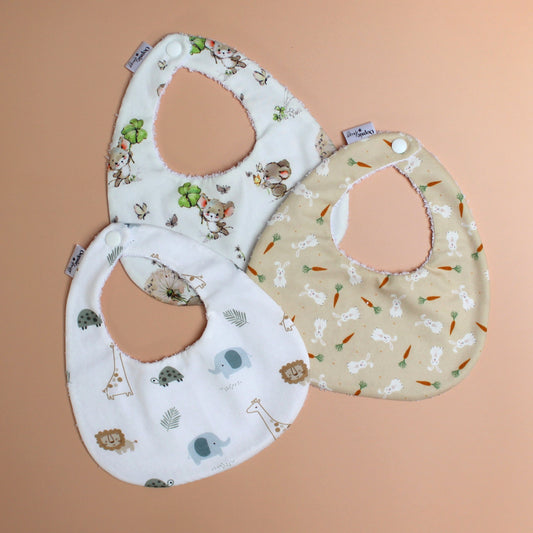 Three baby bibs with animal designs