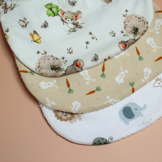 Three baby bibs with animal designs
