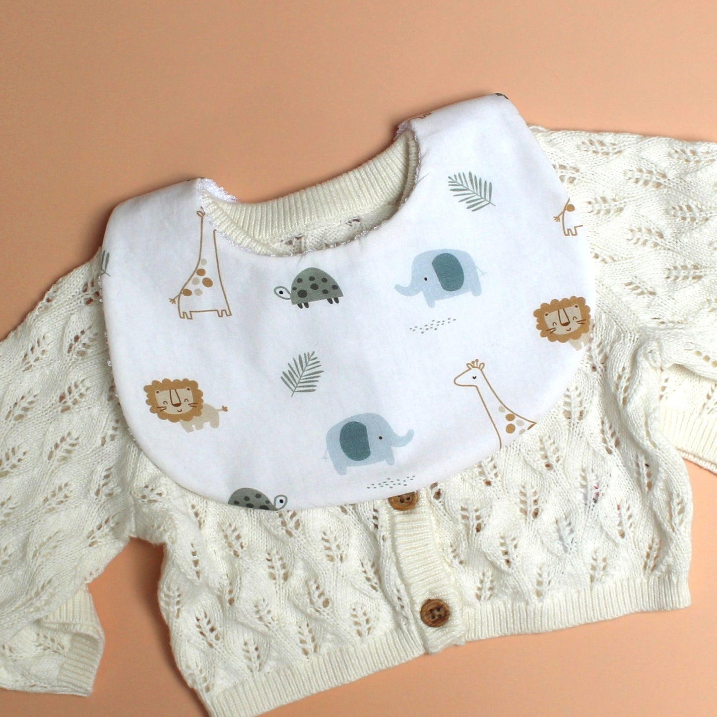 baby bib with little jungle animal pattern