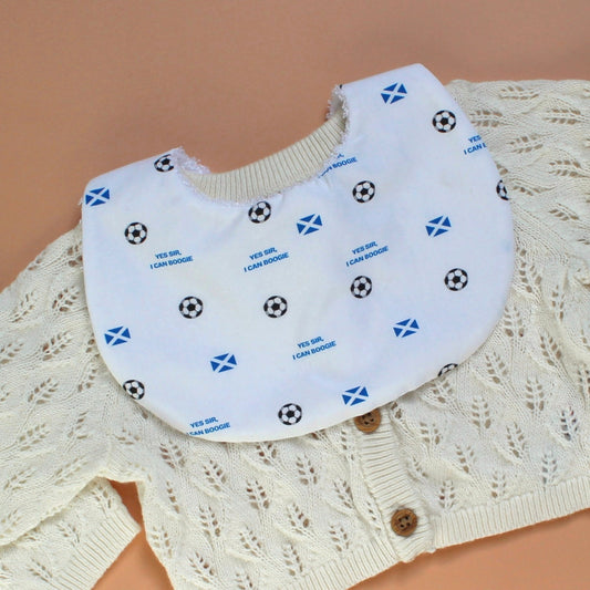 Scotland football baby bib with scotland flag, footballs and Yes sir, I can boogie slogan