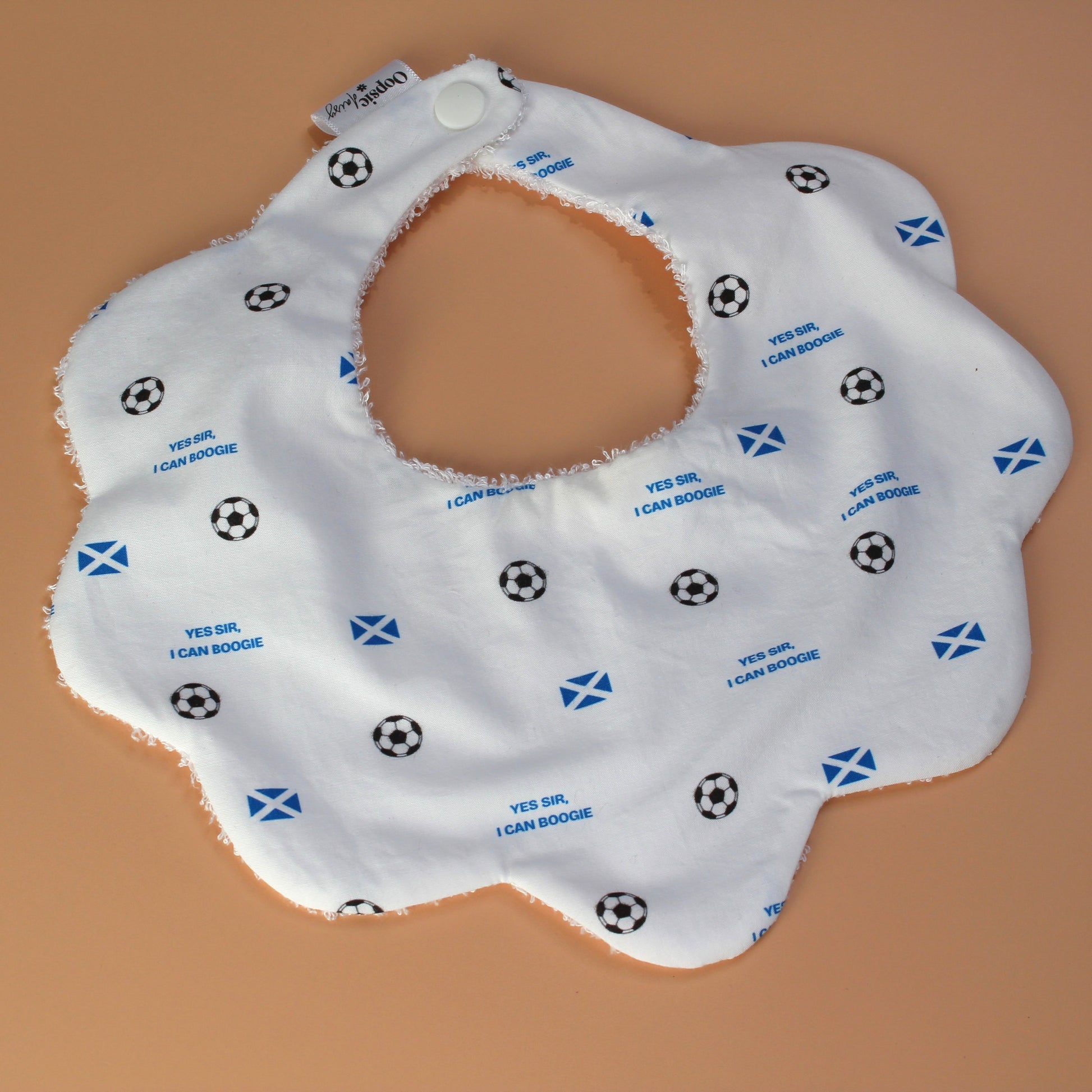Scotland football baby bib with scotland flag, footballs and Yes sir, I can boogie slogan