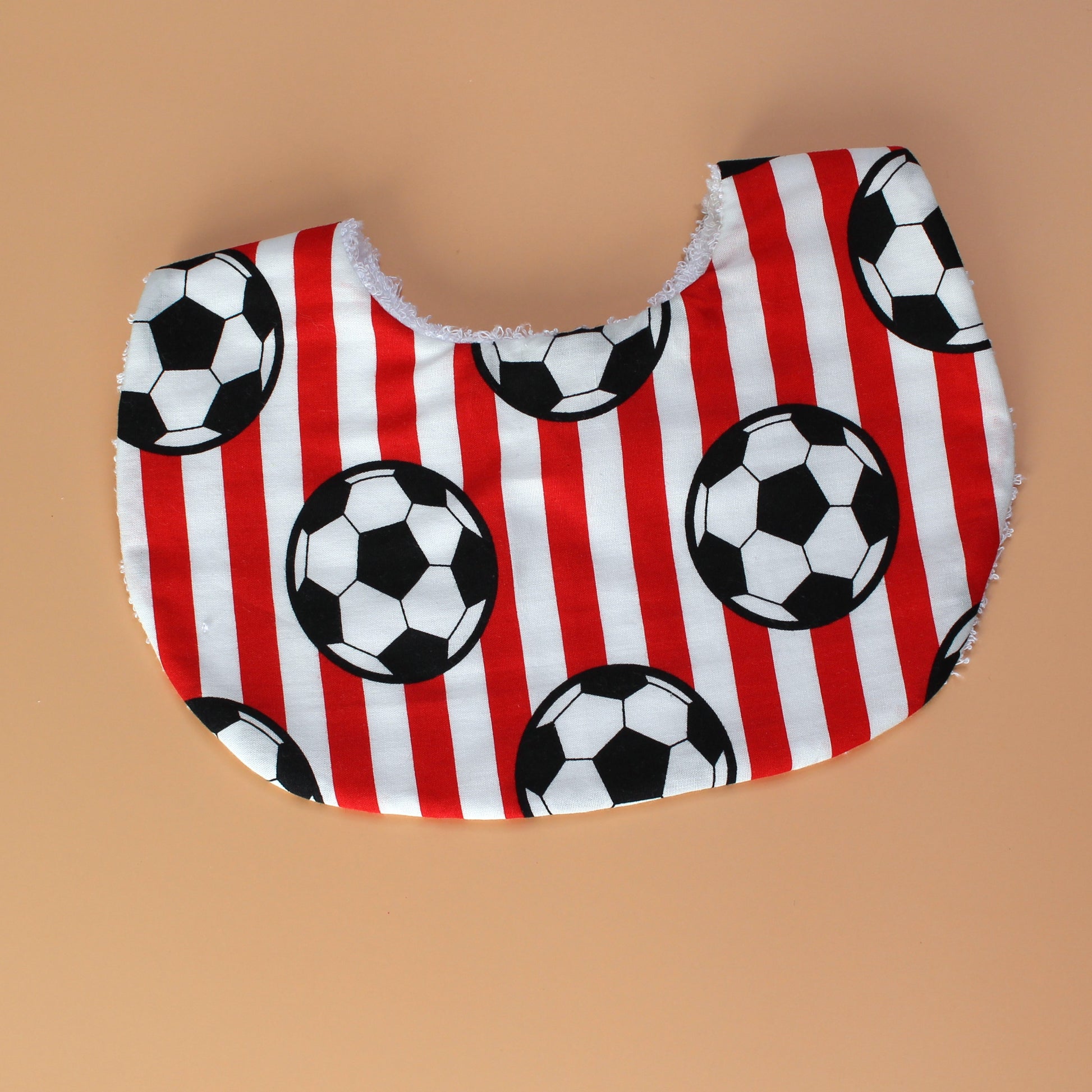 Red and white striped football baby bib