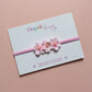 Pink baby headband with 3 pink flowers