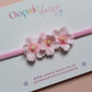 Pink baby headband with 3 pink flowers