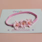 Pink baby headband with 3 pink flowers