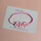 Pink baby headband with 3 pink flowers