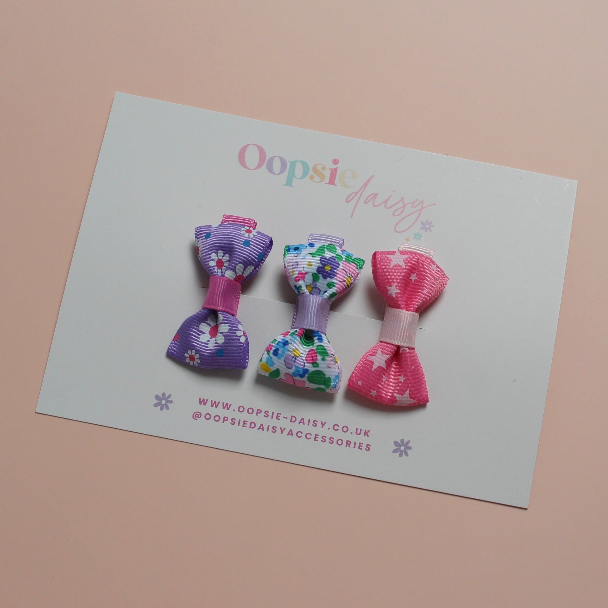 Set of 3 mini hair bow clips with flower and star patterns