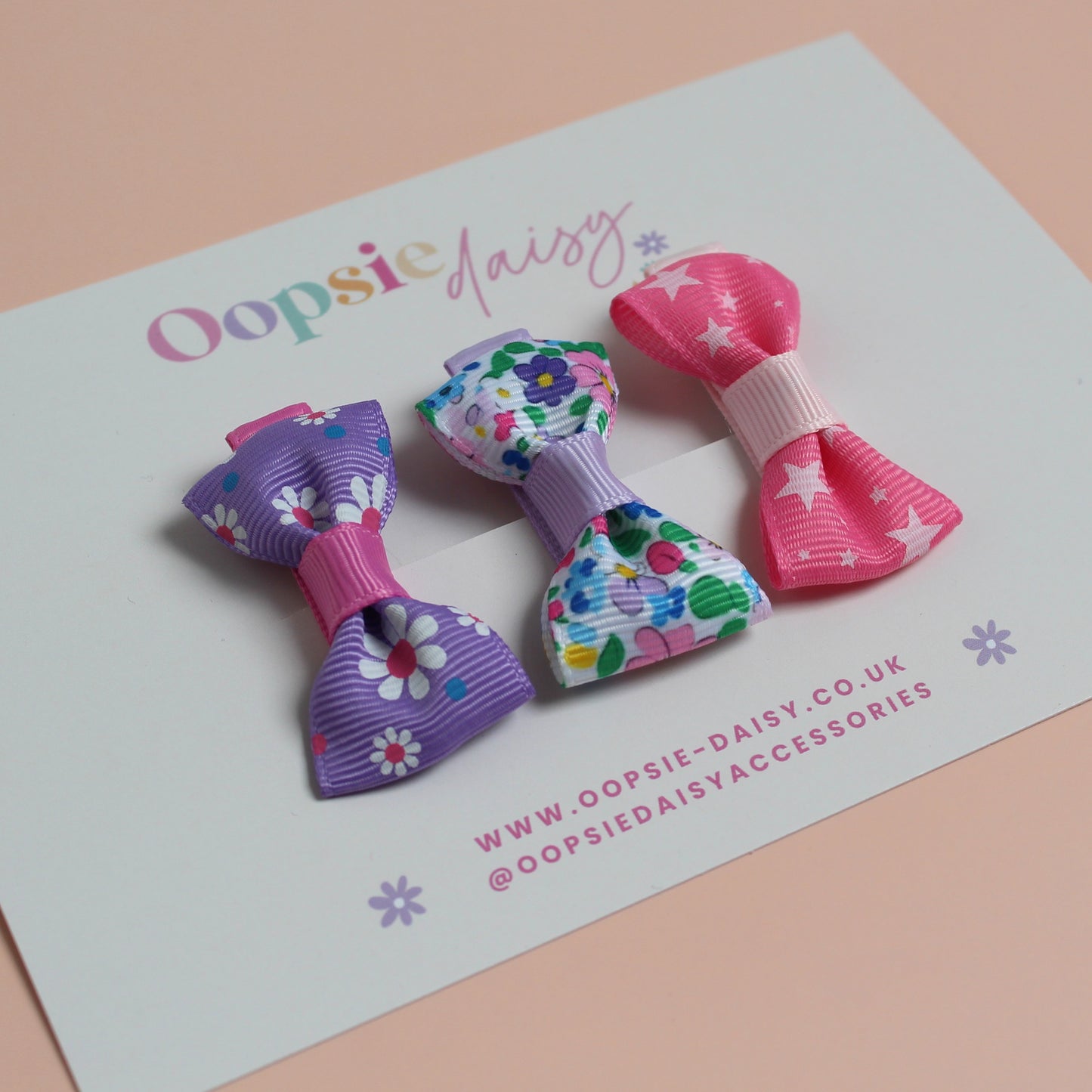 Set of 3 mini hair bow clips with flower and star patterns