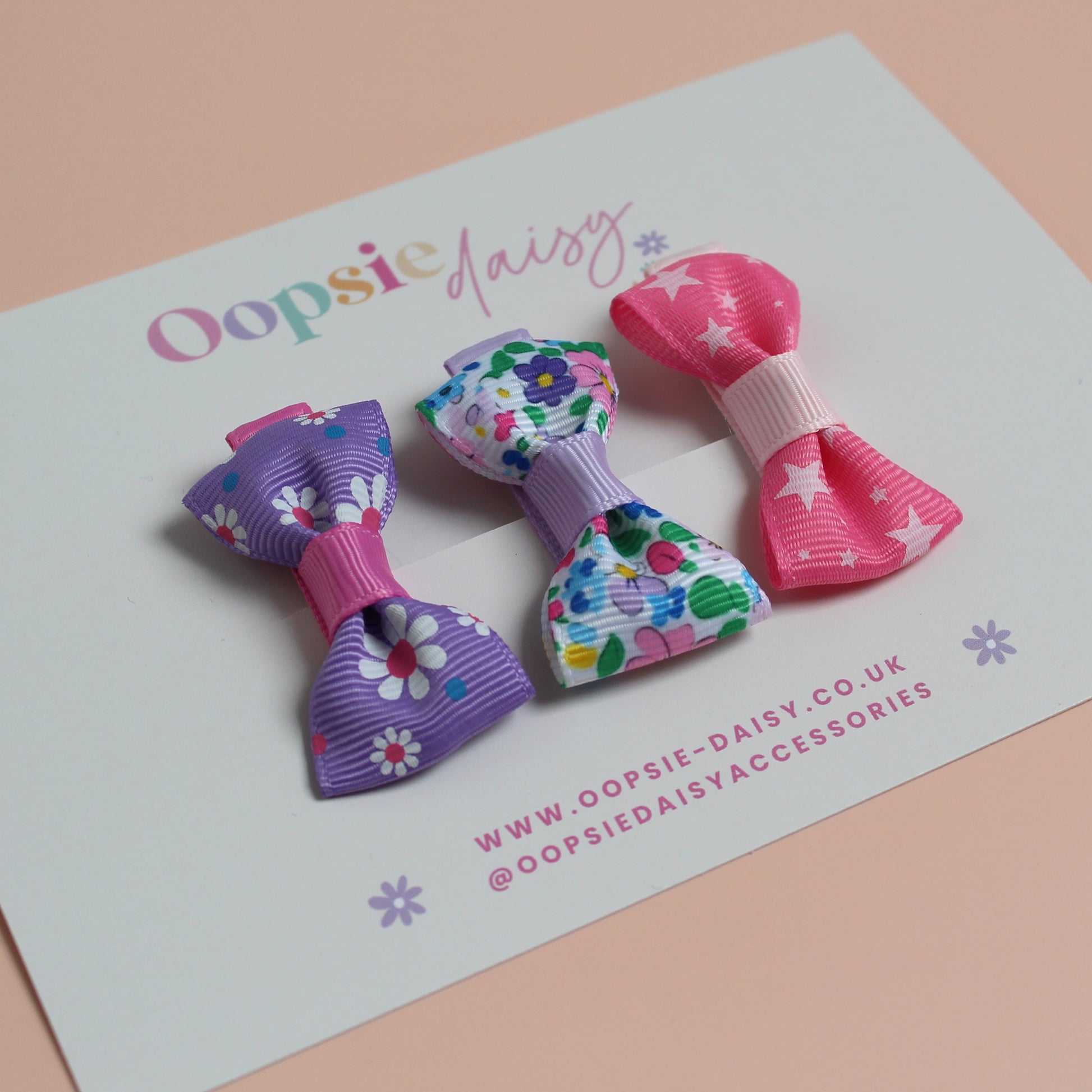 Set of 3 mini hair bow clips with flower and star patterns