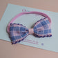 pink baby headband with pink and purple check gingham bow