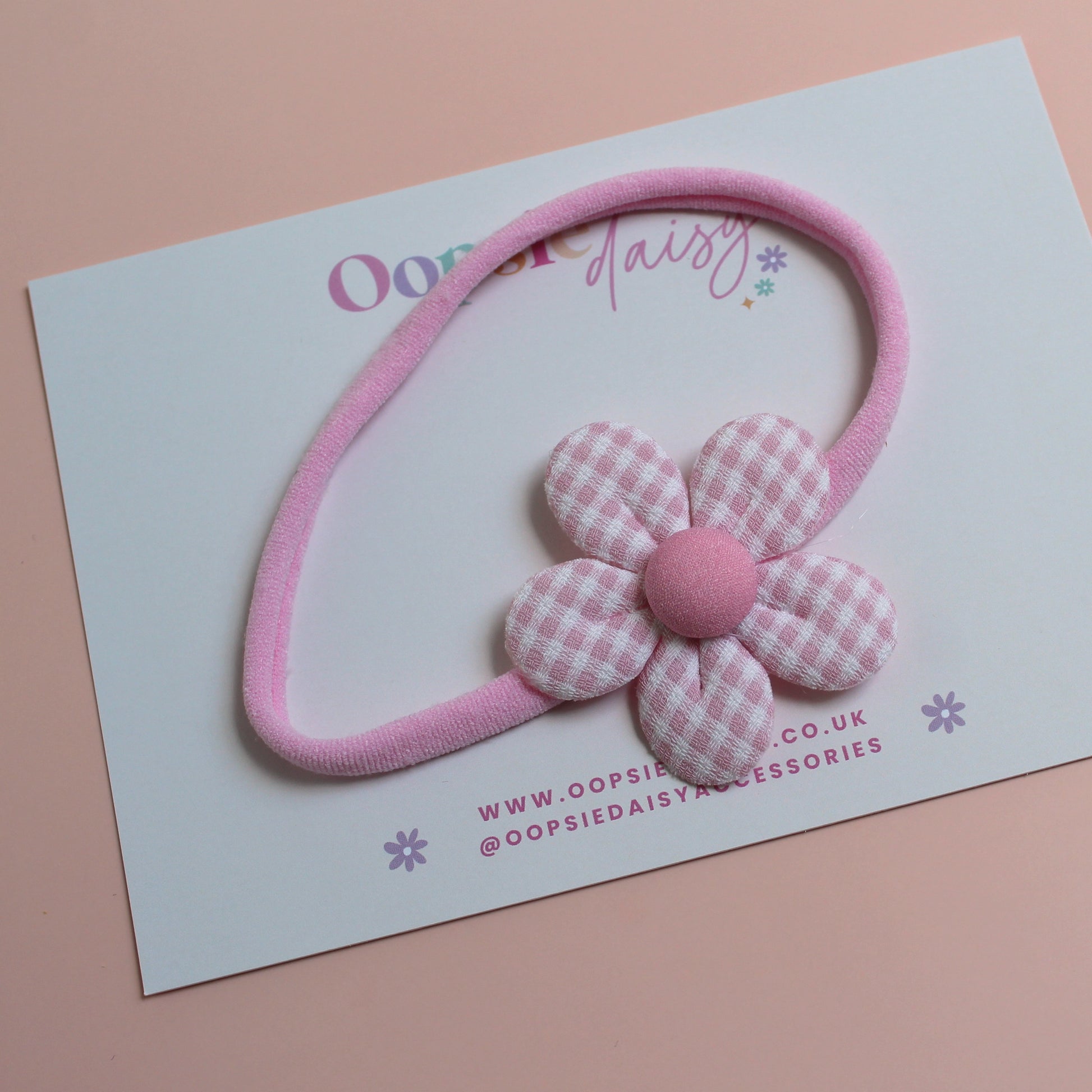 Pink baby headband with matching gingham flower