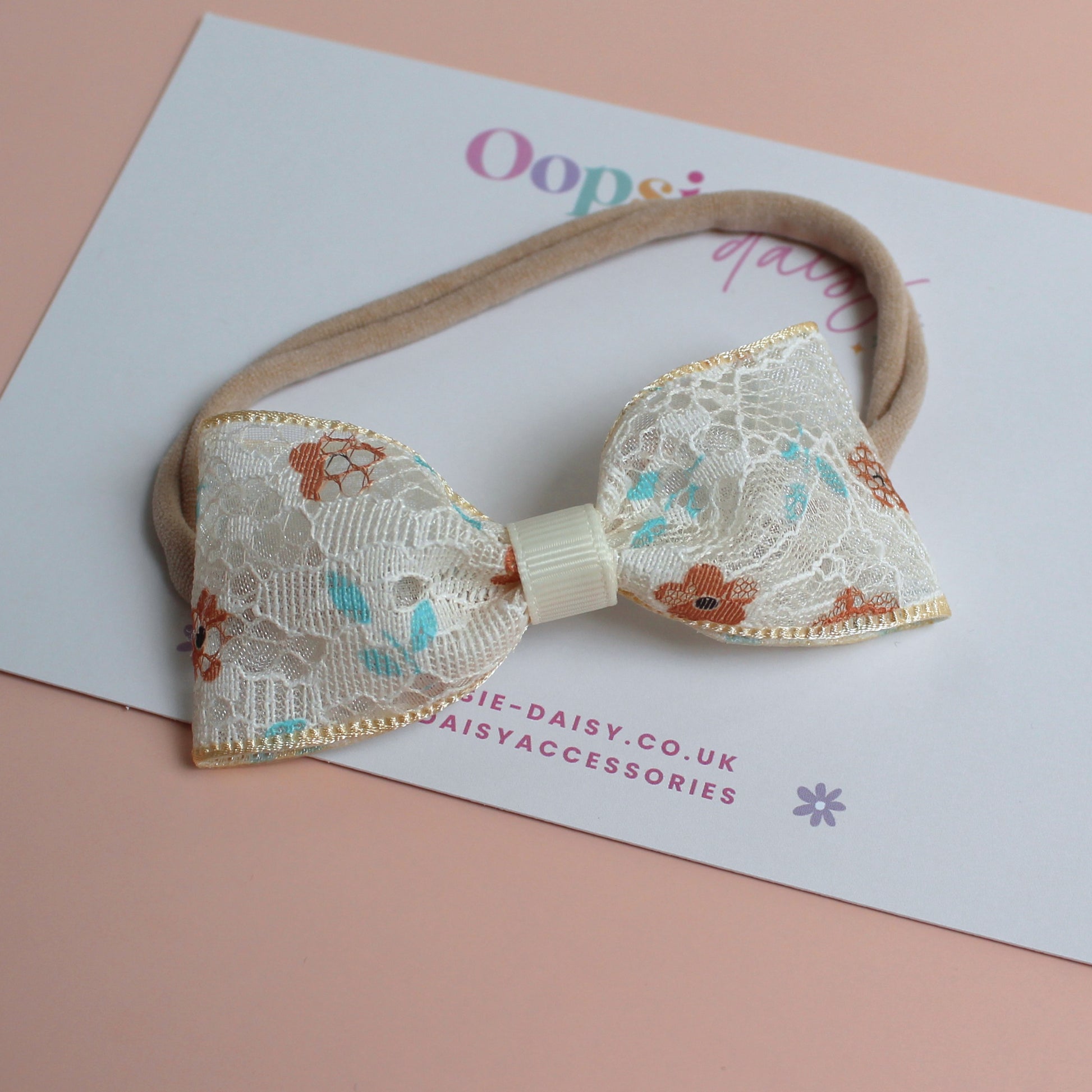 Floral lace bow on baby headband