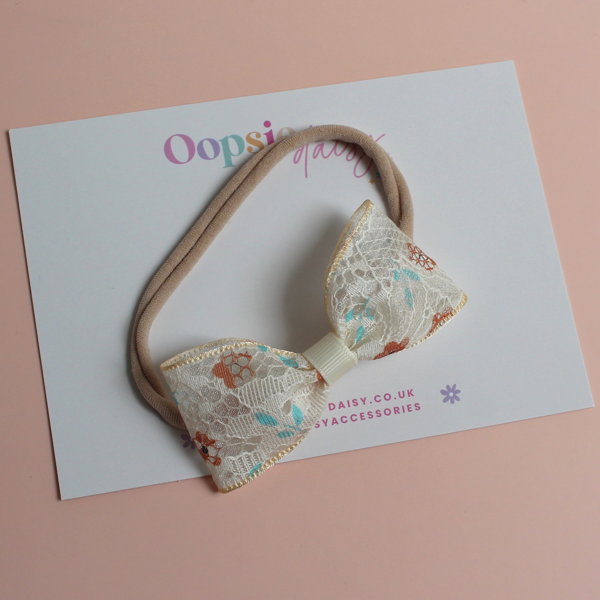 Floral lace bow on baby headband