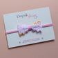 Pink baby headband with colourful lace bow