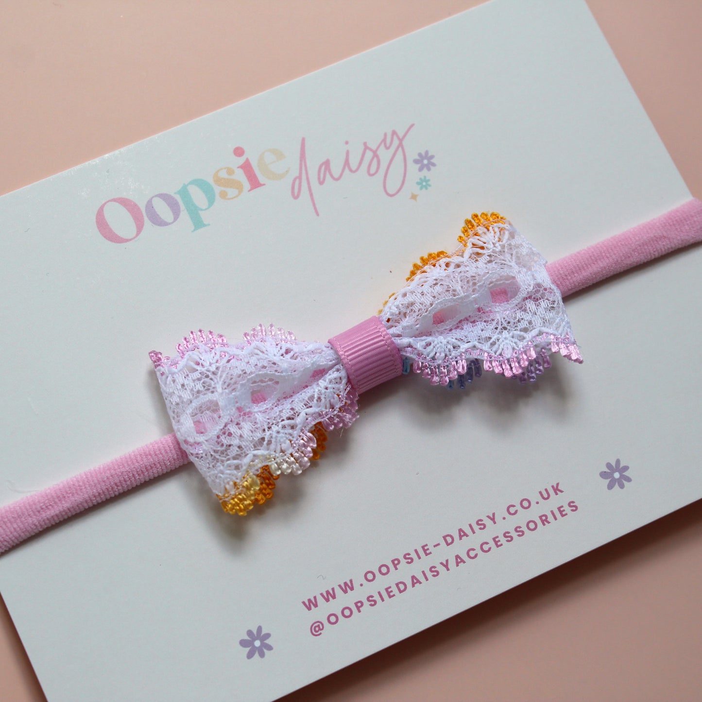 Pink baby headband with colourful lace bow
