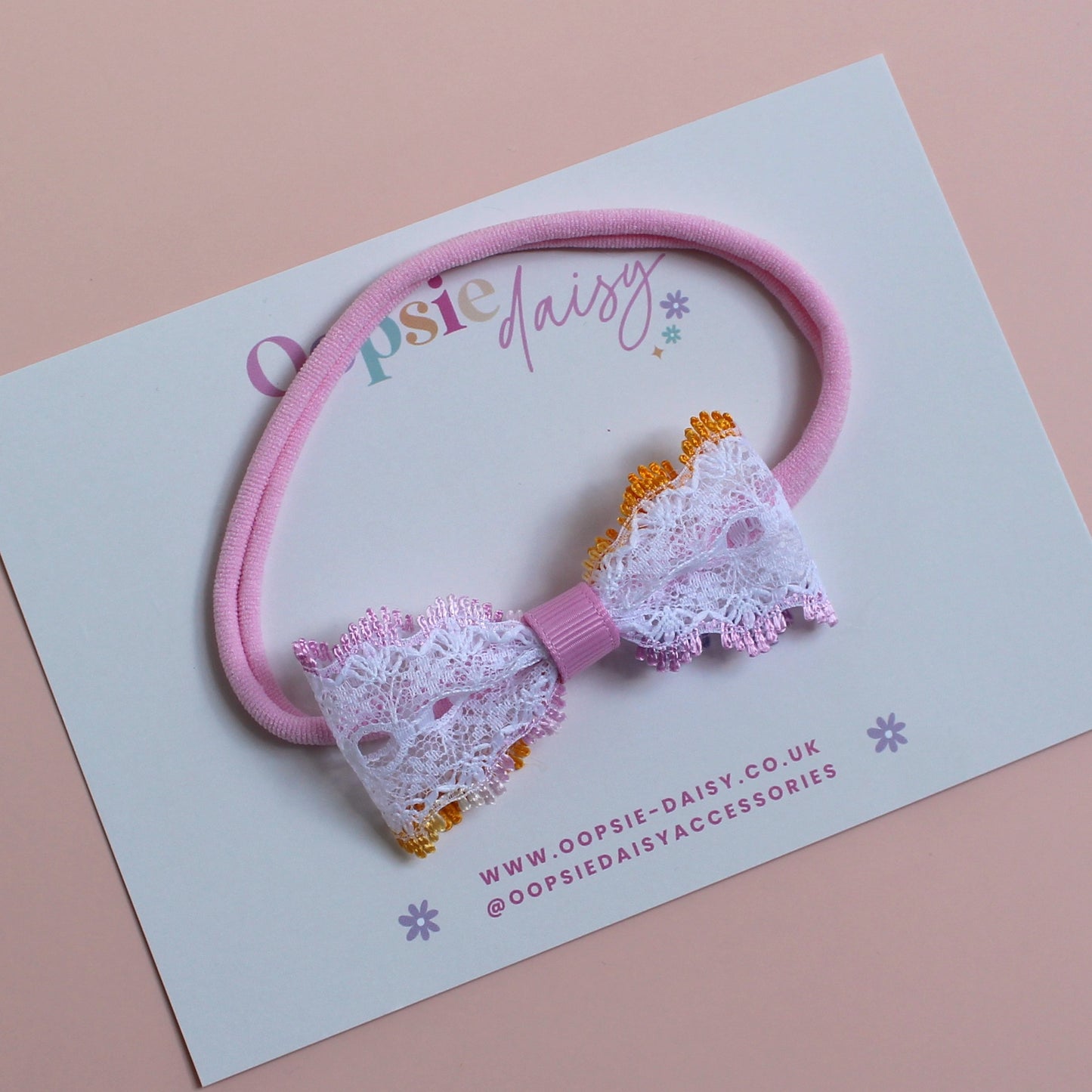 Pink baby headband with colourful lace bow