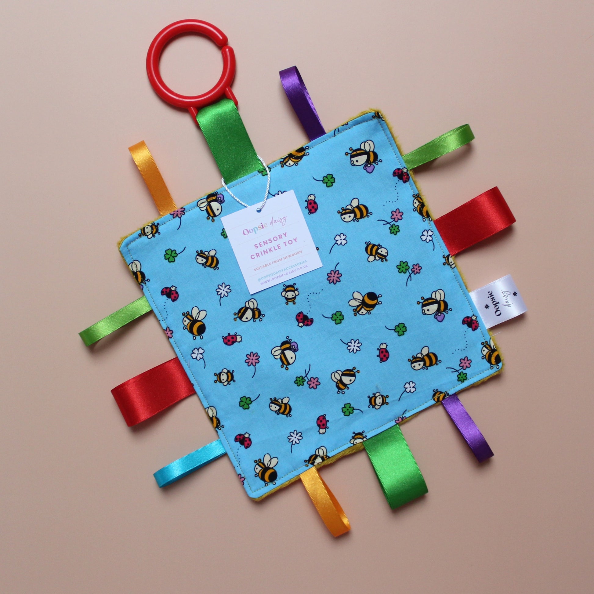 Sensory crinkle baby tag toy with bee pattern