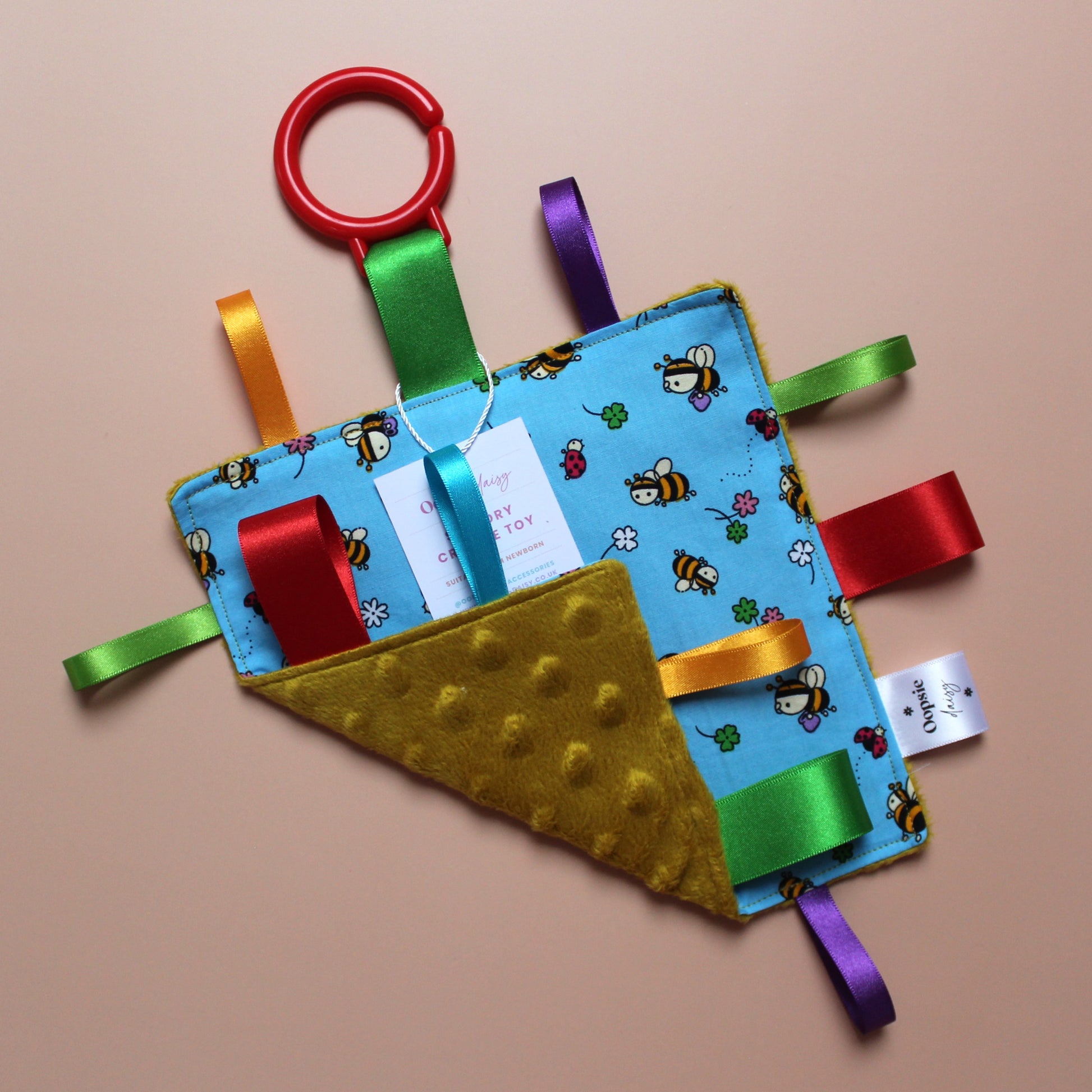 Sensory crinkle baby tag toy with bee pattern