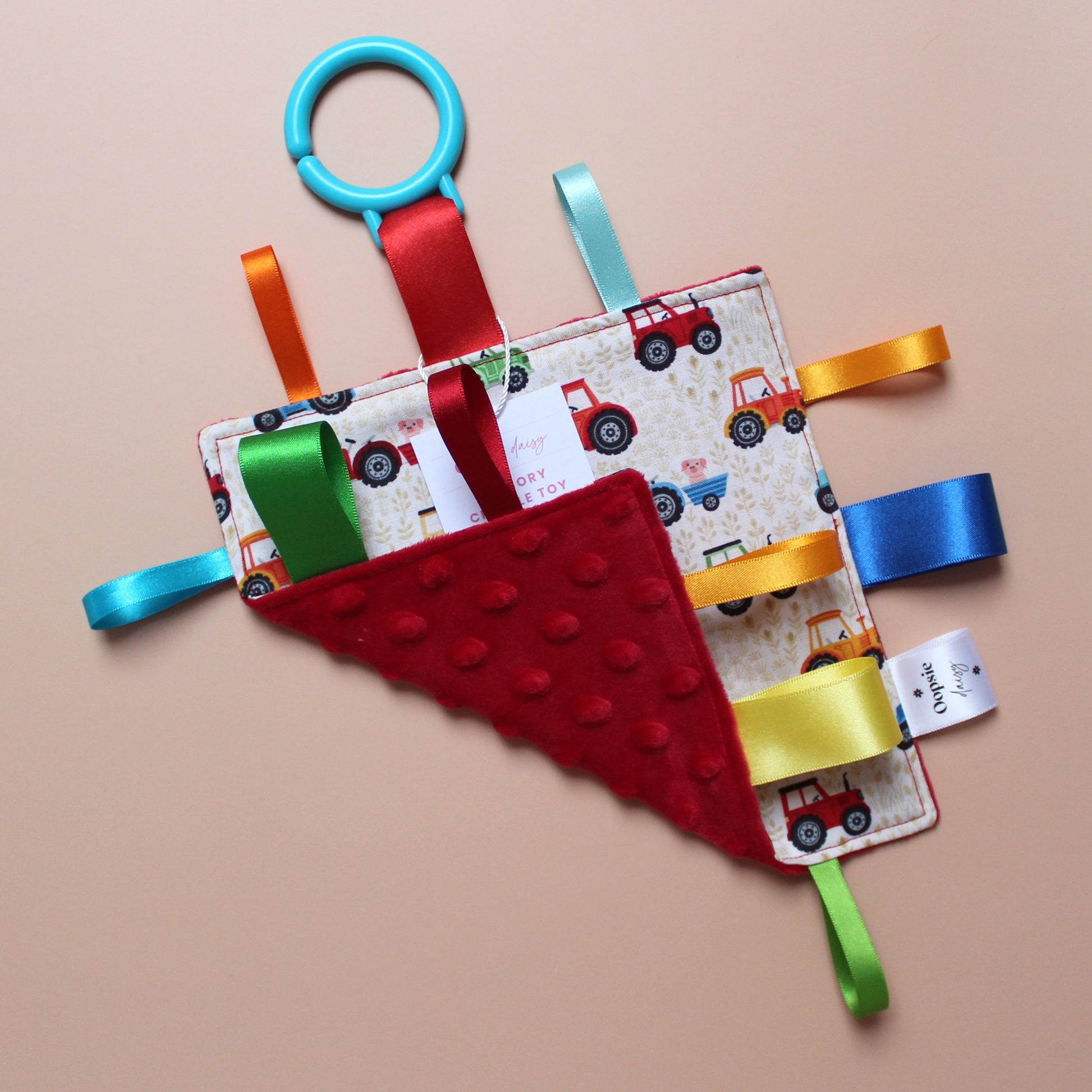 Sensory crinkle tag baby toy with tractor pattern