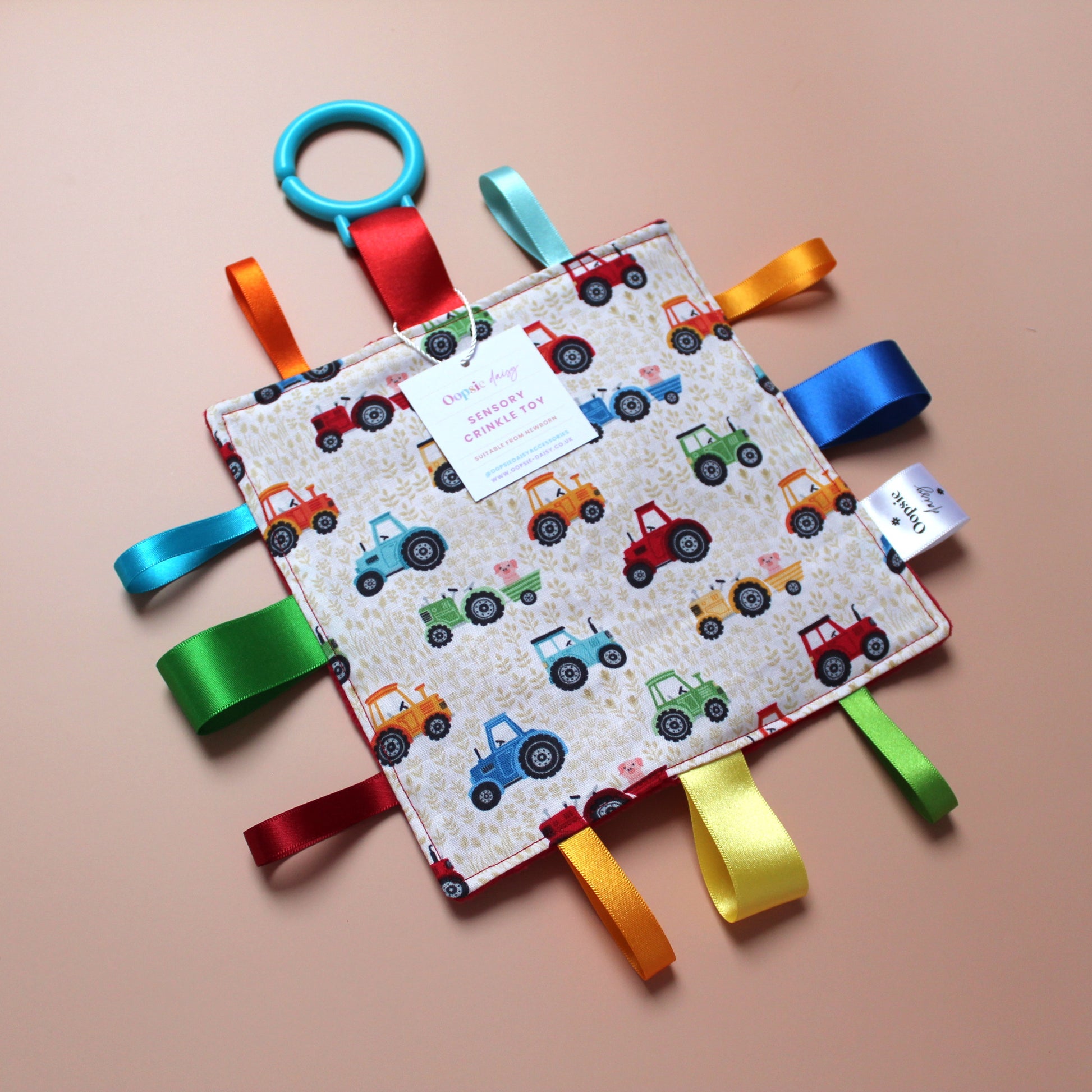 Sensory crinkle tag baby toy with tractor pattern