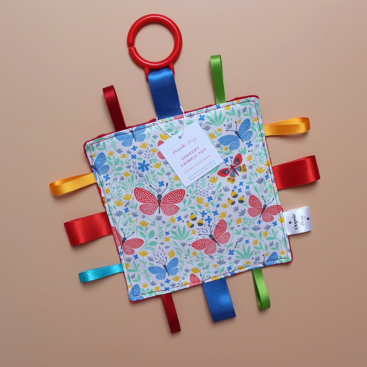 Sensory crinkle tag baby toy with butterfly pattern