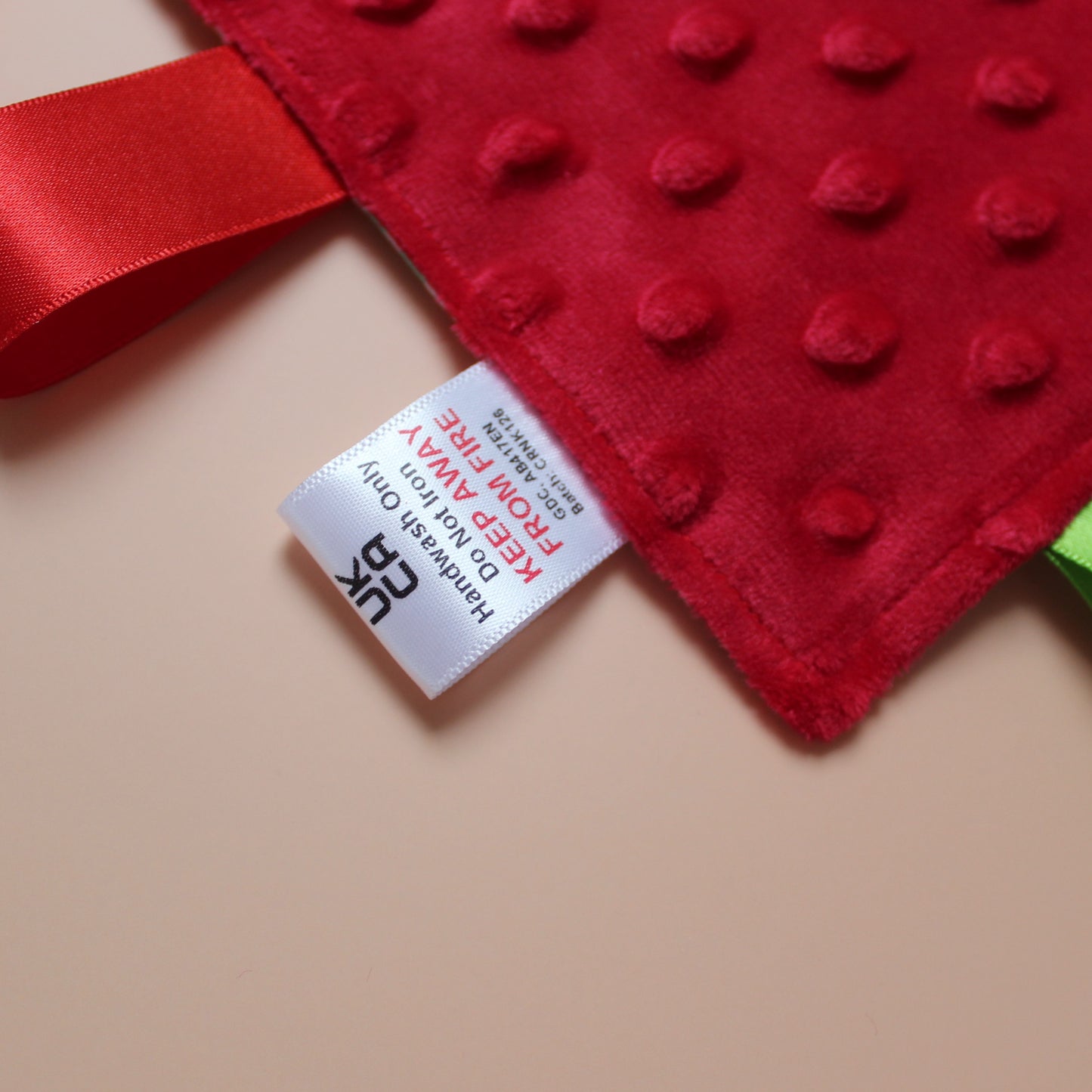 Sensory crinkle tag baby toy with butterfly pattern